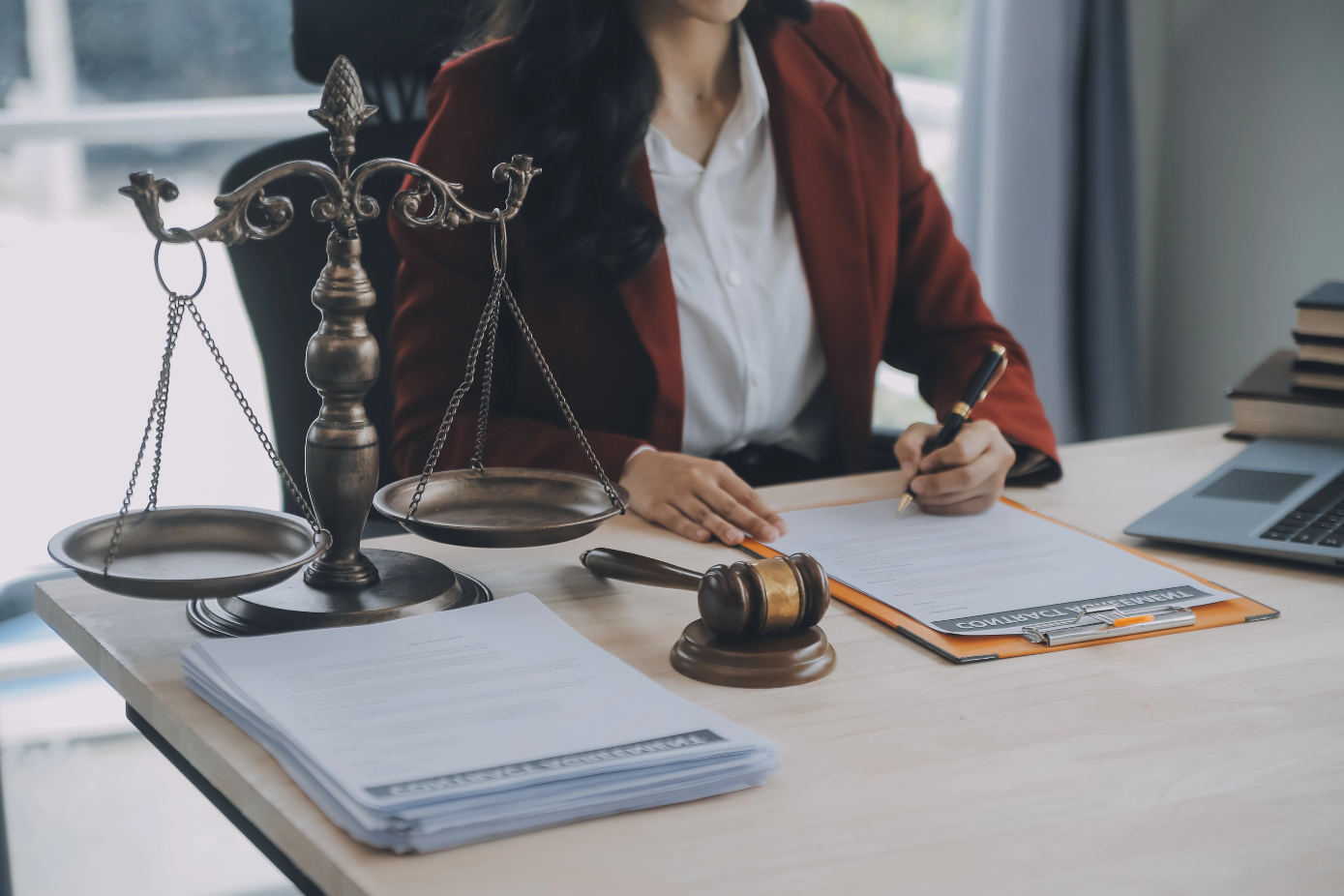 Business Lawyers Discussing Contract Papers Business Lawyers Discussing Contract Papers